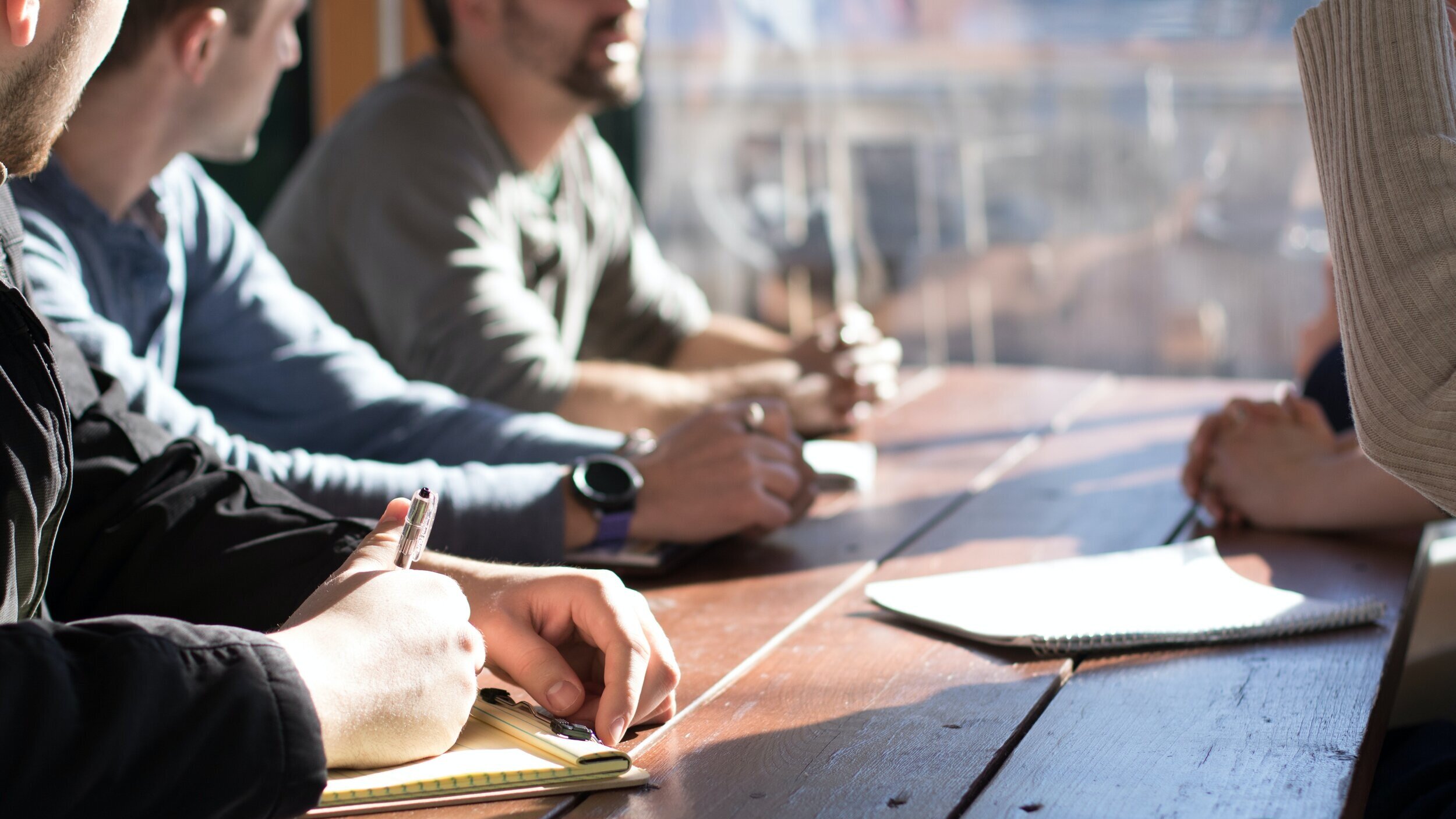 group discussion at a desk